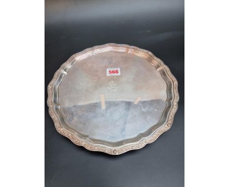 A silver salver, by Hamilton &amp; Inches, Edinburgh 1925,&nbsp;engraved crest to centre, 26cm diameter, 666g. Provenance: Si