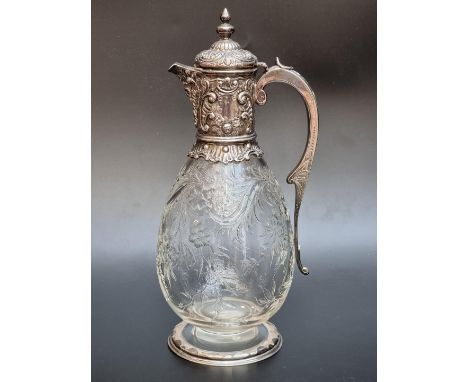 A good Victorian silver mounted 'Rock Crystal' glass claret jug, by Charles Edwards, London 1891, the glass probably by Steve