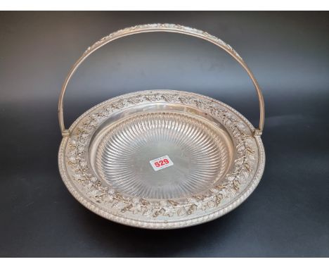 An impressive silver swing handled basket, by&nbsp;Goldsmiths &amp; Silversmiths Co Ltd, London 1925, 27cm diameter, 1321g. 