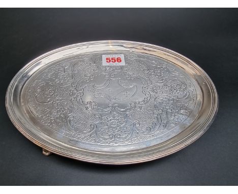A George III silver teapot stand, by&nbsp;John Crouch I &amp; Thomas Hannam, London 1793, 24.5cm wide, 409g. 