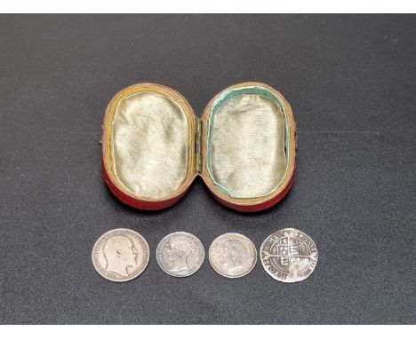 Coins: a Elizabeth I 1562 hammered silver threepence, with rose and date; together with a Victoria 1859 silver threepence; tw