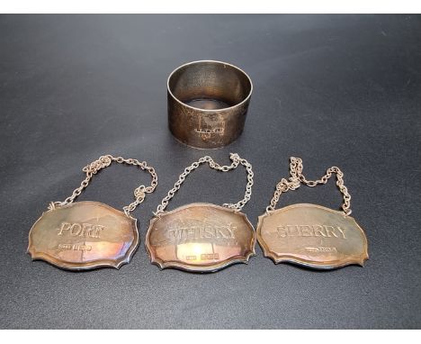 A set of three silver decanter labels, sherry, port and whisky, by C Robathan &amp; Son, Birmingham 1989/92; together with a 