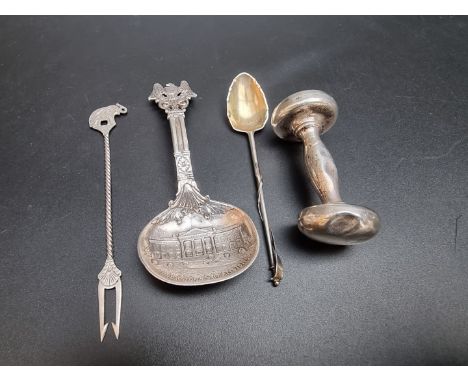 An American white metal spoon, commemorating the Presidents Mansion (The White House), by Harris &amp; Shafer, stamped 'Sterl