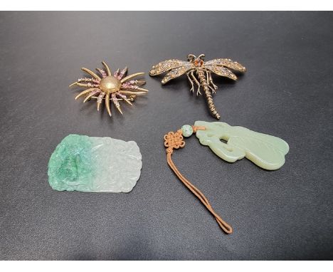 A Chinese carved jade plaque, decorated dragon, 5.5cm high; together with a Chinese carved jade fruit pendant, 5.5cm high; an