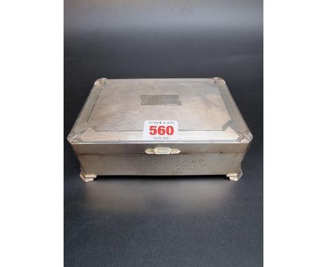 An engine turned silver cigarette box, by&nbsp;Charles S Green &amp; Co Ltd, Birmingham 1934, 17cm long. Provenance: Sir John