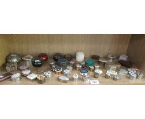 A mixed lot of trinket and pill boxes in enamel, wood, lacquer, bone etc.,