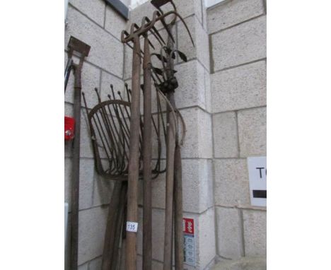 A quantity of garden tools.
