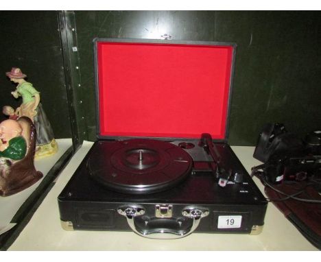 A modern table top record player.