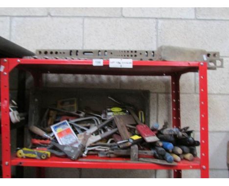 2 shelves of tools and tool stands,.