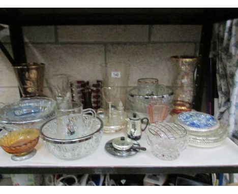 A shelf of glass ware.