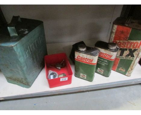 A BP Shell petrol can with 3 Castrol cans, petrol gauge, Smith's amp gauge and one other amp gauge.