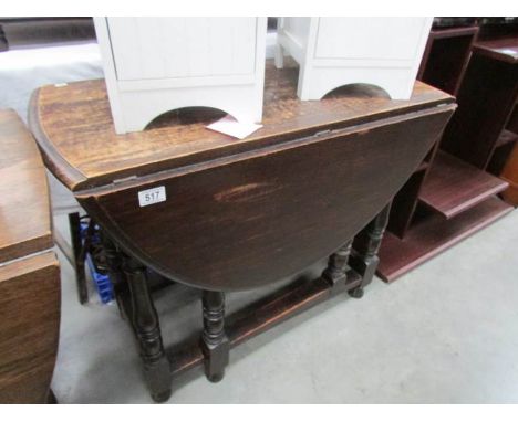 An oak gate leg table.