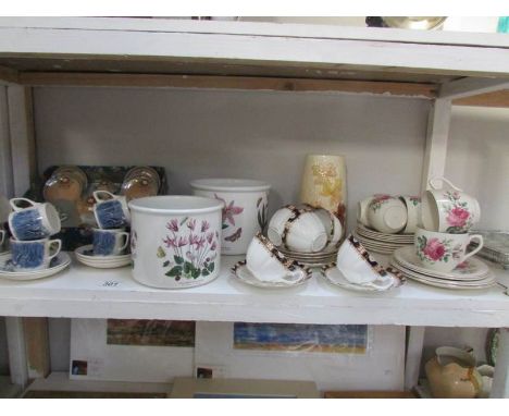 A shelf of miscellaneous including Portmerion planters, child's tea set etc.,