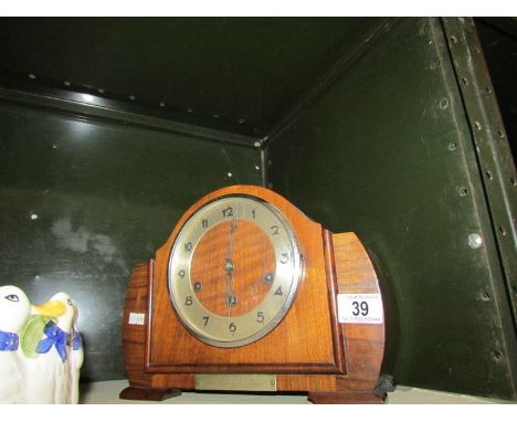 A mantel clock.
