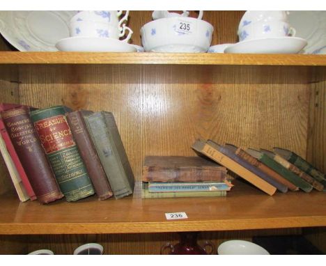 A shelf of old books.