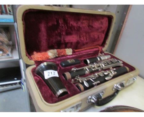 A cased clarinet.