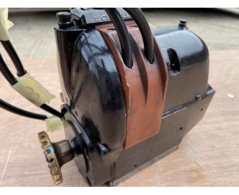 A Scintilla GN4 clockwise rotation 4-cylinder magneto, with bracket, by repute in good working order.