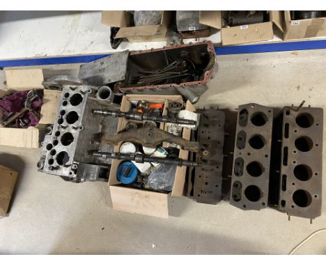 A good quantity of Alvis 12/50 engine parts including a crankcase, sump, two blocks, two camshafts, manifold, etc.