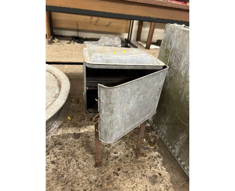 A vintage galvanised water heater