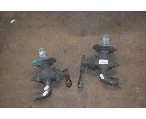 Two vintage metal taps