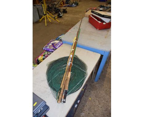 Mixed lot of vintage fishing rods together with a keep net