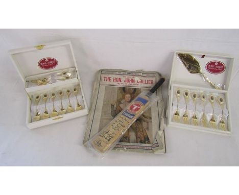 Cased Royal Albert gold plated Old Country Rose cutlery, The Art Annual 1914 and a miniature Taurus cricket bat with signatur