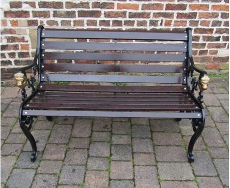 Wooden bench with cast iron lion head bench ends&nbsp;