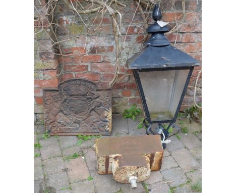 Cast iron toilet cistern, metal street lamp &amp; a cast iron fire back plate