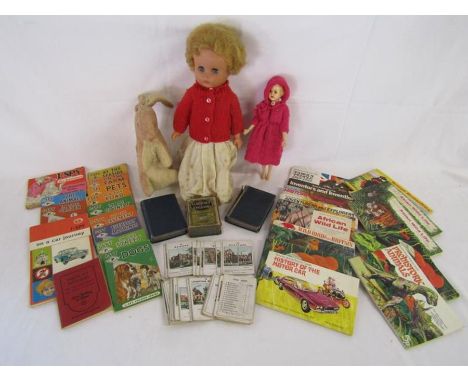 Collection of toys includes Agrespoly D220 doll, I-Spy books, The Counties of England 2nd series Jaques &amp; Son, cigarette 