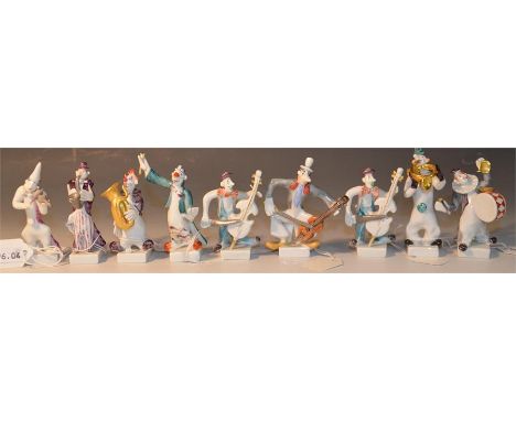 Nine Meissen Peter Strang figures, of band members playing various instruments. Circa 1993-95. Heights 7.5cm-8cm. (9)