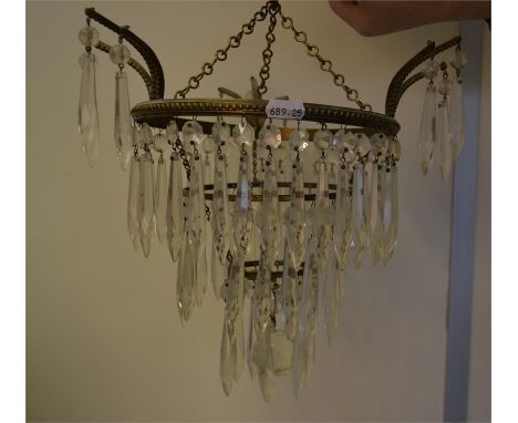 A glass light fitting, with multiple glass droplets. Untested.