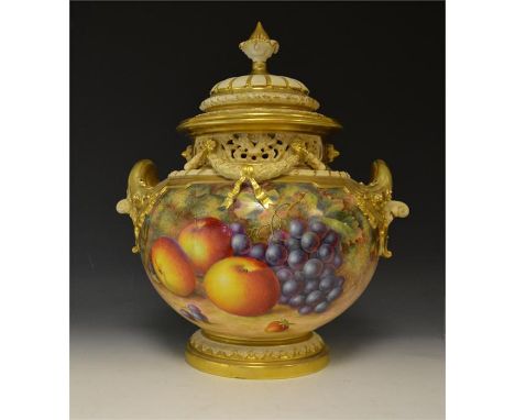 A large Royal Worcester potpourri and cover, partially decorated with fruit, signed by Ayrton. With gilt embellishment and fl