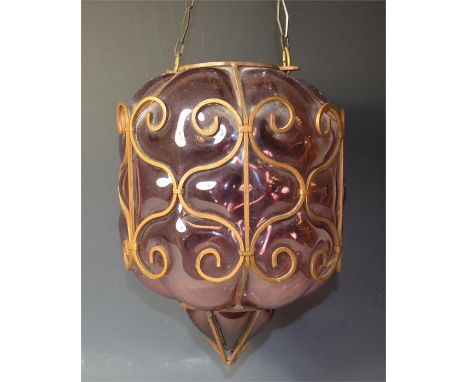 An aubergine coloured glass light fitting (posssibly Whitefriars) with original chain. Early 20th Century.  Height 33cm. 