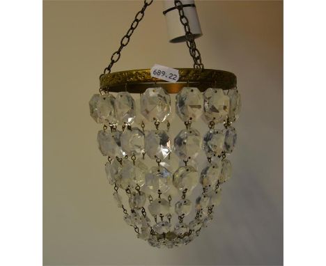 A glass light fitting, with multiple glass droplets. Untested.