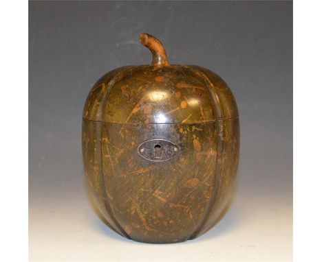 A fine melon shaped fruitwood tea caddy. Height 15cm to top of stalk.