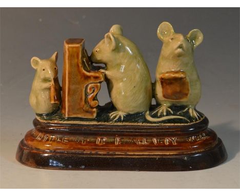 A Doulton George Tinworth mouse group, depicting a mouse playing the piano, a mouse singing and another playing another instr