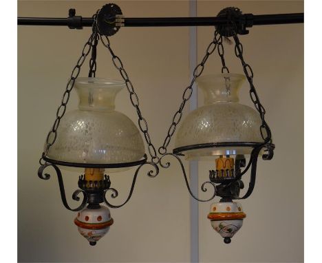 A pair of glass light fittings. Untested.