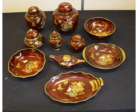 Fifteen pieces of Carlton Ware 'Rouge Royale,'  consisting of five jars and covers and four dishes and a table lighter (15)