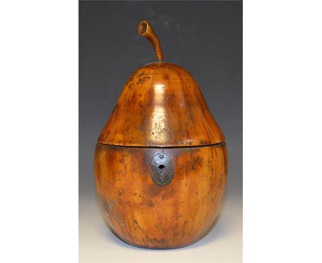 A fine pear shaped fruitwood tea caddy. Height 18cm to top of stalk.