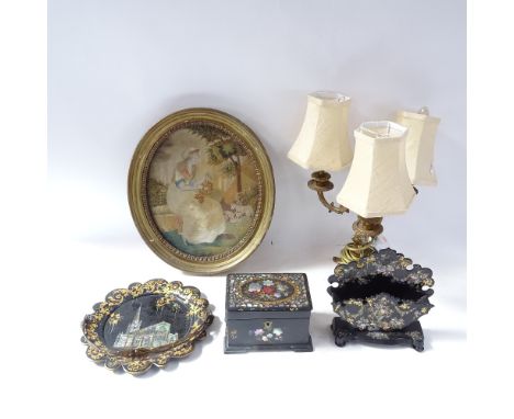 A collection of painted papier mache items, a brass 3-branch cherub table lamp, and a silk embroidered picture (5) 