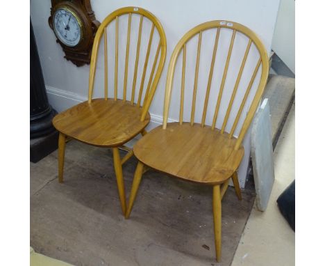 Pair of Ercol elm-seated and beech stick-back chairs 