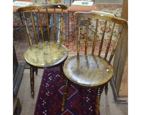 A pair of Vintage elm penny seated stick-back kitchen chairs on turned legs 