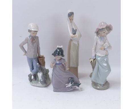 4 NAO figures, tallest 26cm 