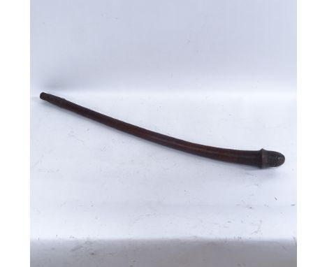 An African Tribal carved hardwood phallus fertility stick, length 83cm 