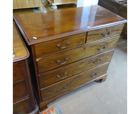 A Georgian crossbanded mahogany chest of 2 short and 3 long drawers, on bracket feet 