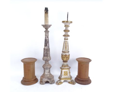 A 19th century painted and gilded pricket table candlestick, a silvered carved wood converted lamp, and a pair of turned wood