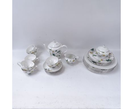A China tea service with white floral decoration 