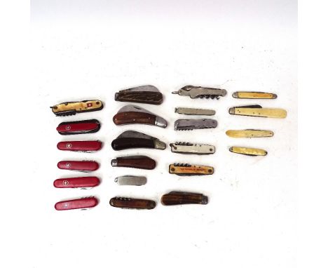 Various pocket knives and Swiss Army knives, including examples with stag horn grips 
