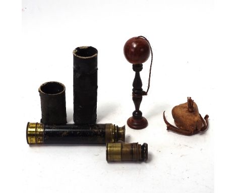 Various interesting collectables, including a leather falconry hood, turned wood ball and cup game, and 2 brass-cased extendi