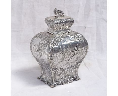 A 19th century French silver tea caddy of rectangular baluster form, with relief embossed scenes, cast lion knop and maker's 